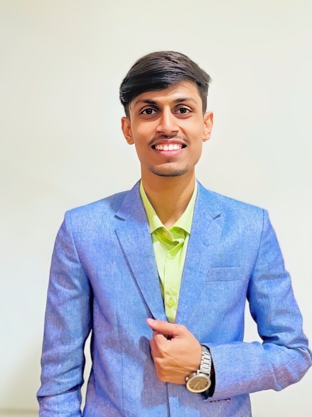 A professional portrait of Shivam Jadhav